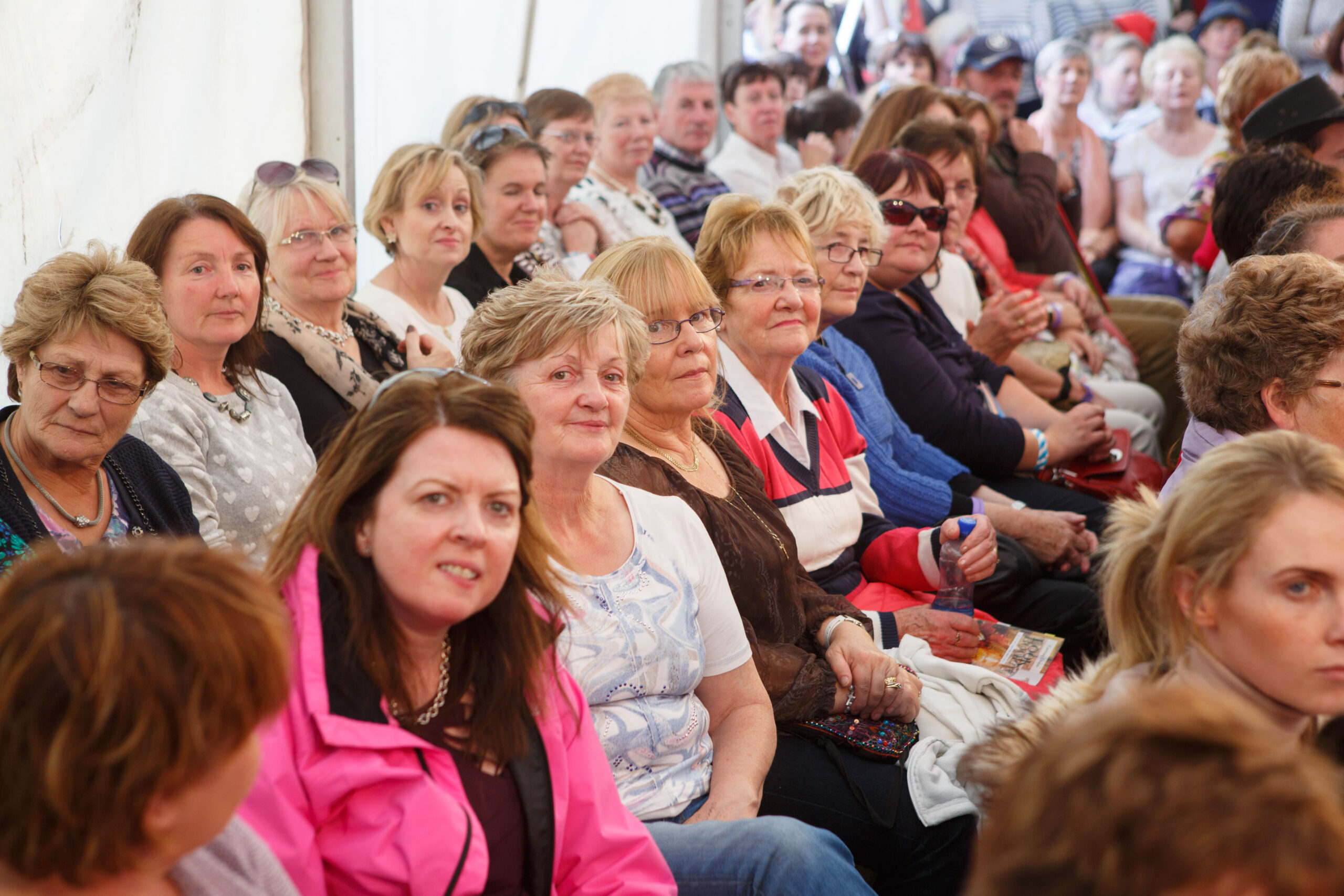 Crowds at the fashion show during the day. 