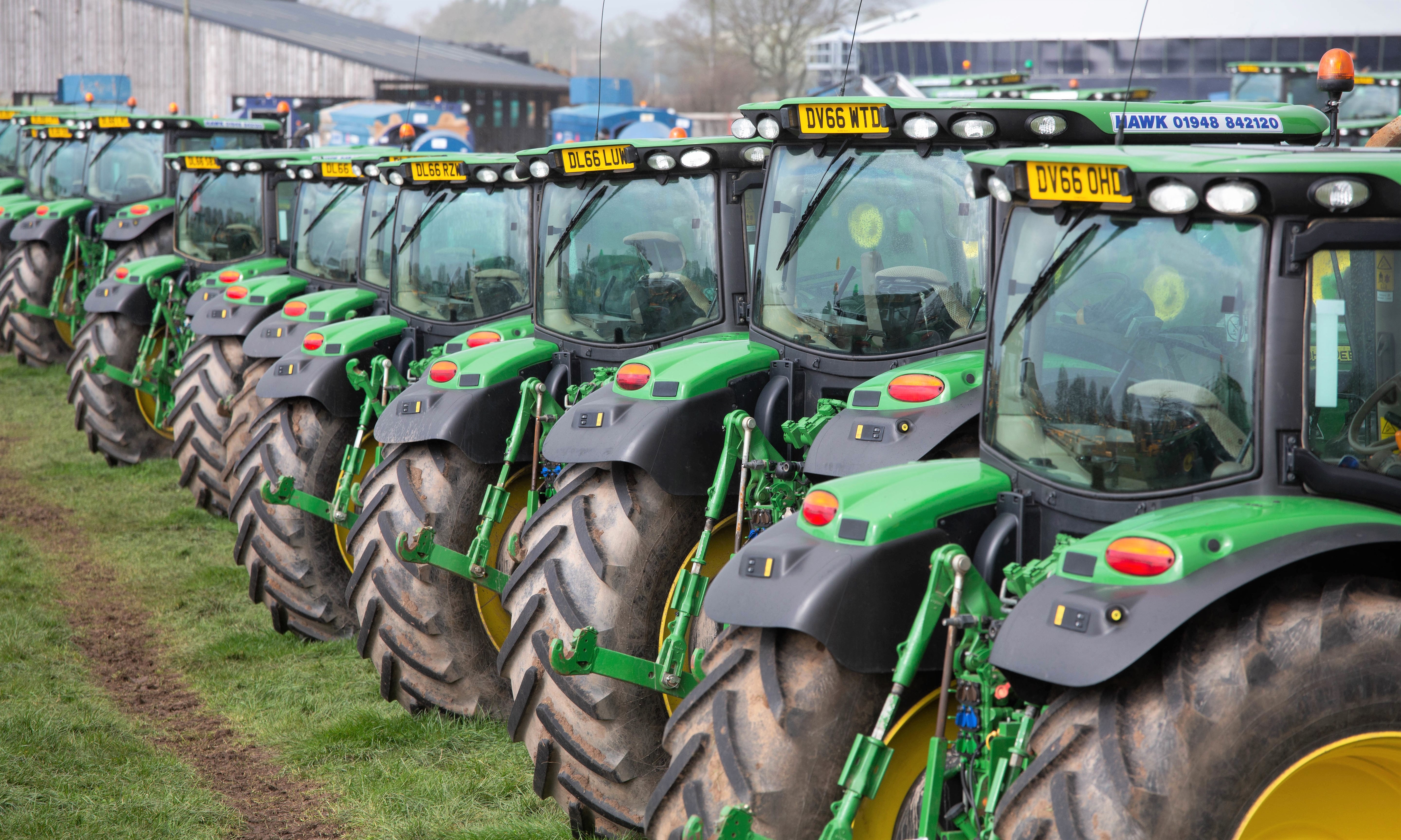 Auction report Sample 6R/M Series tractor prices from giant sale
