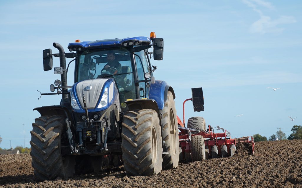Tractor and cultivator