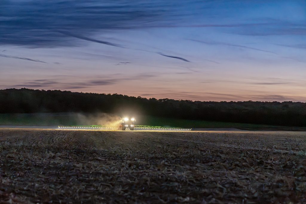 A new MY27 John Deere 500R sprayer working during the night