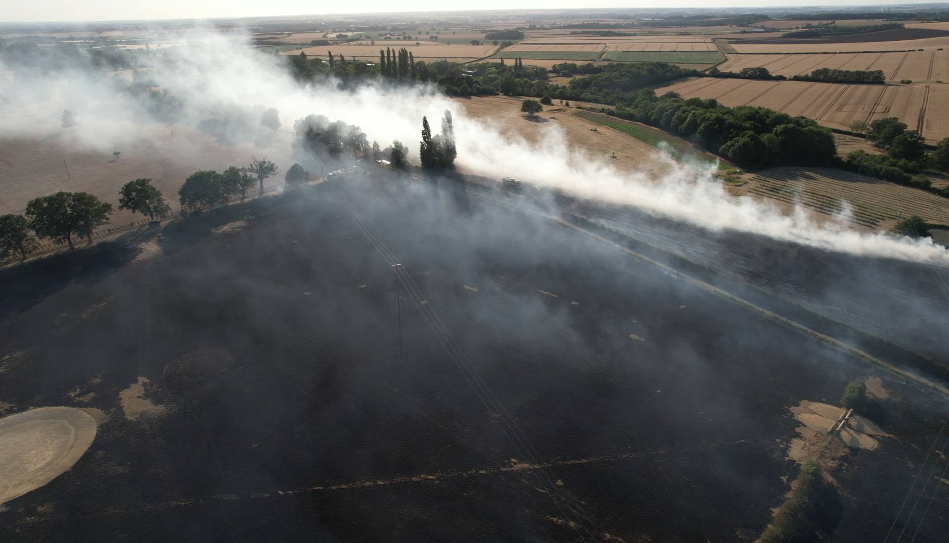 Pics: Farmers mobilise to help crews halt massive grass fire in UK