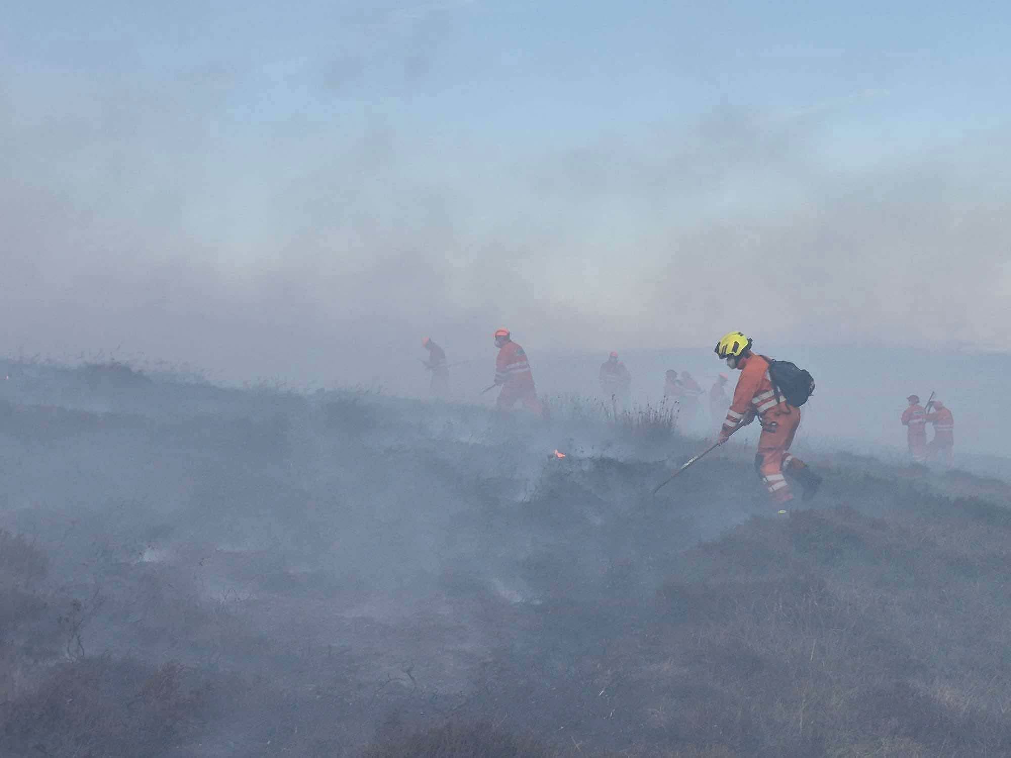 High fire risk persists as firefighters continue wildfire fight